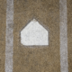 Baseball home plate embedded in a dirt infield between chalk baselines.