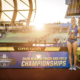 Female athlete in blue uniform holding a trophy on the track at the 2026 NCAA DI Track and Field Championships in Eugene, Oregon.